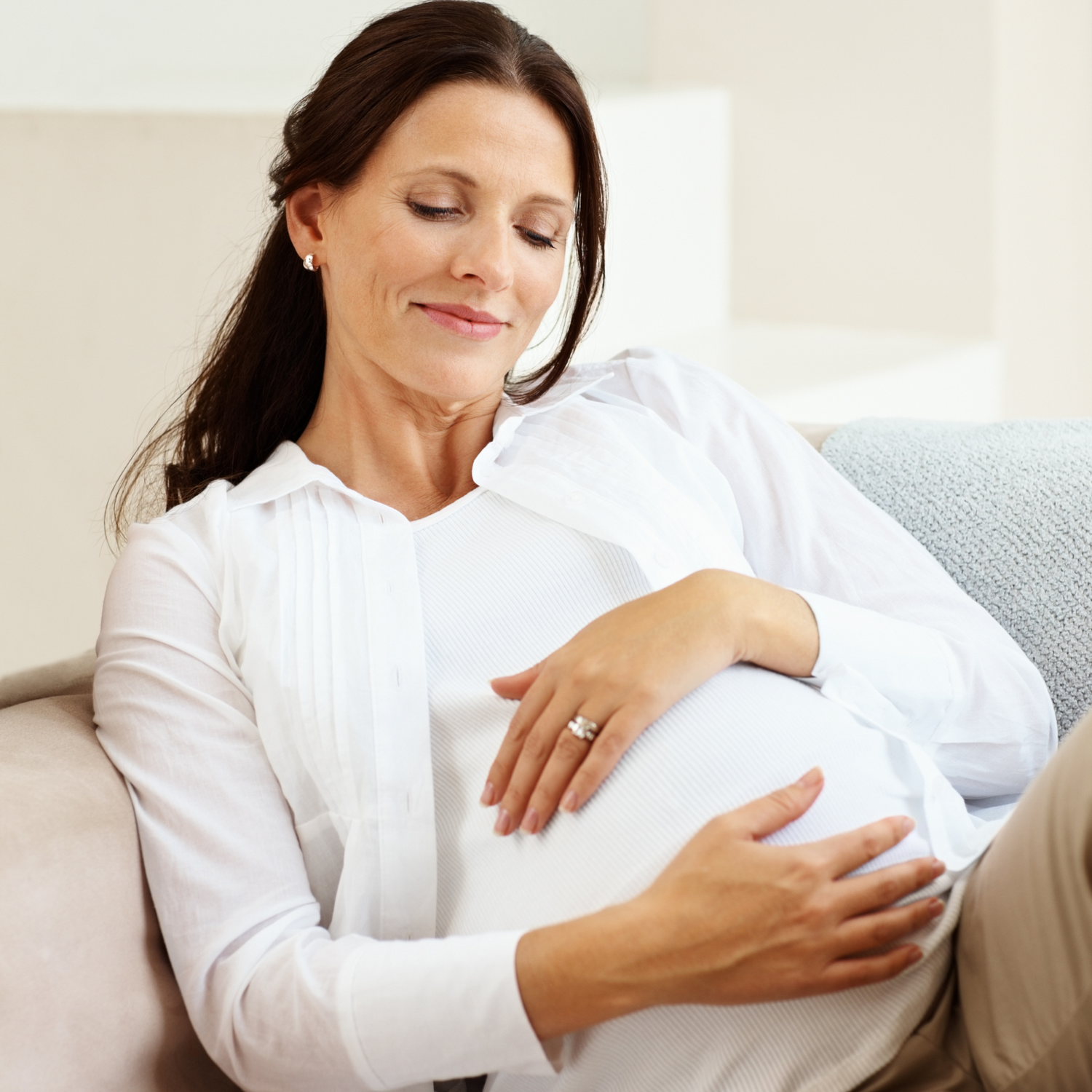 All Day Comfort - Woman Holding Her Pregnant Belly