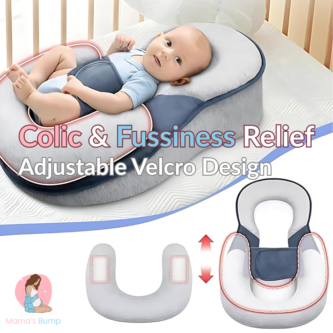 Baby support pillow with adjustable velcro design for colic and fussiness relief, featuring a baby doll on top.