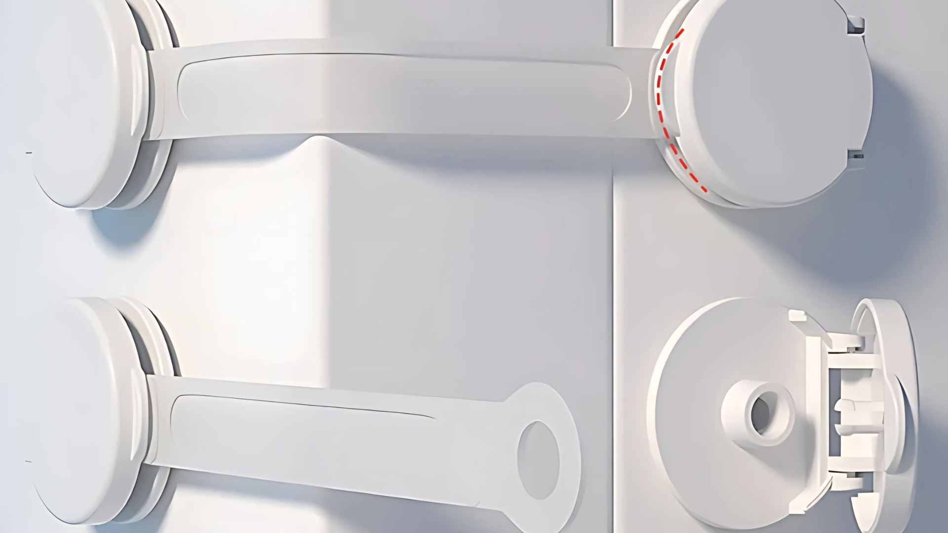 Close-up of a white electronic device with circular components on a light gray background