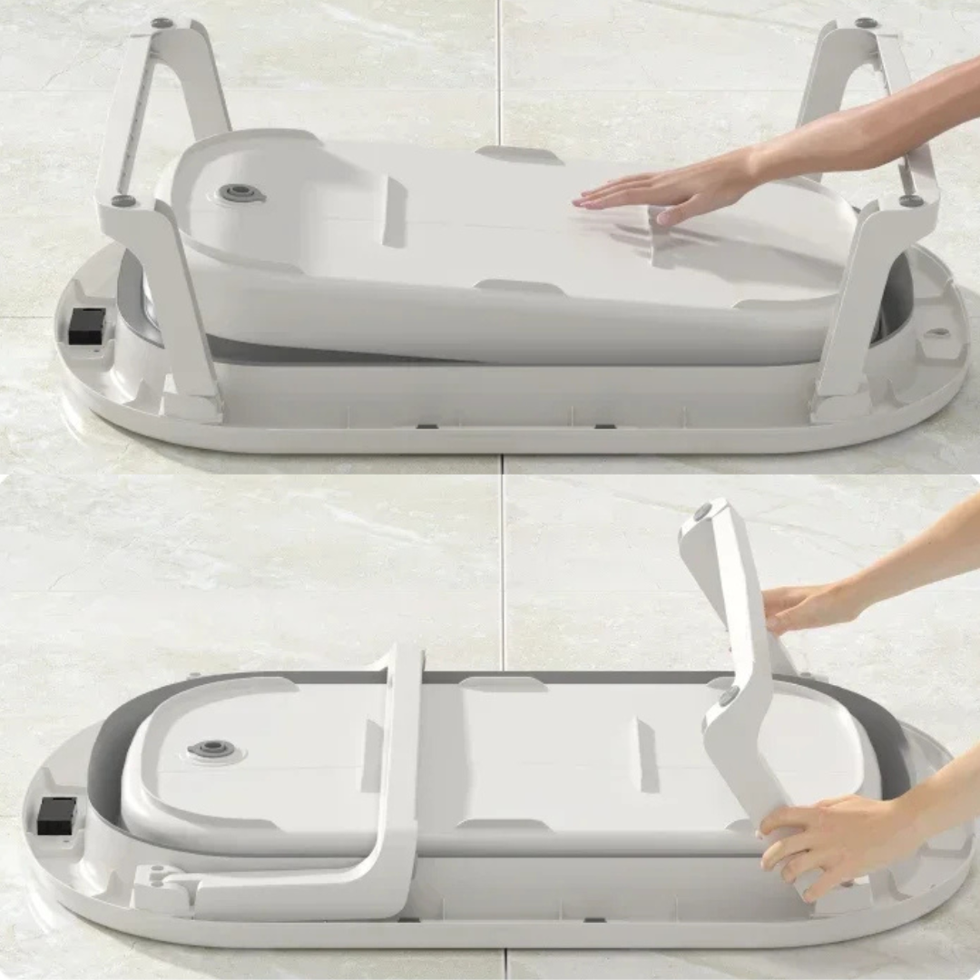 Foldable bathtub with a person demonstrating its compactness on a white floor.