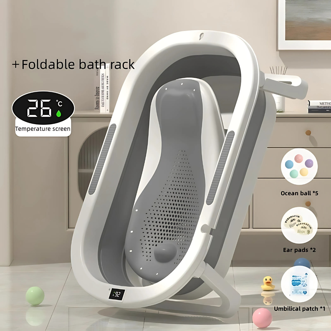 Foldable bath rack with temperature screen and additional items on a bathroom floor.