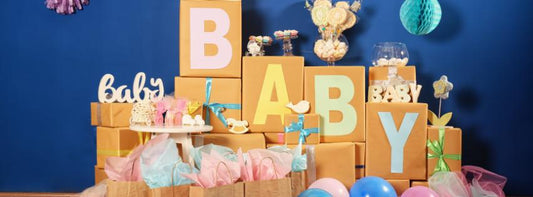 A festive baby shower setting with decorations, gifts, and a cake.