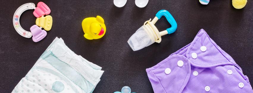 A selection of essential baby items like a stroller, car seat, and diaper bag, arranged neatly.