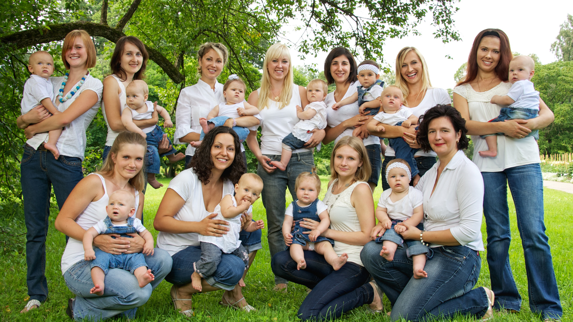 A diverse group of happy parents sharing their experiences