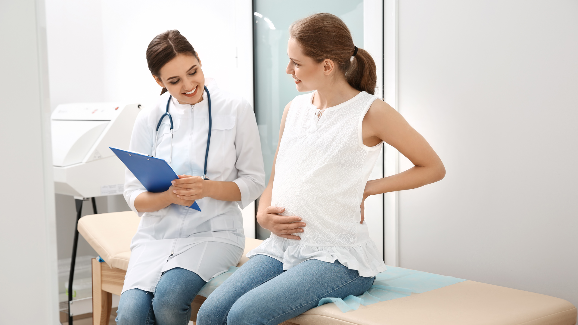 A healthcare professional providing advice to a pregnant woman