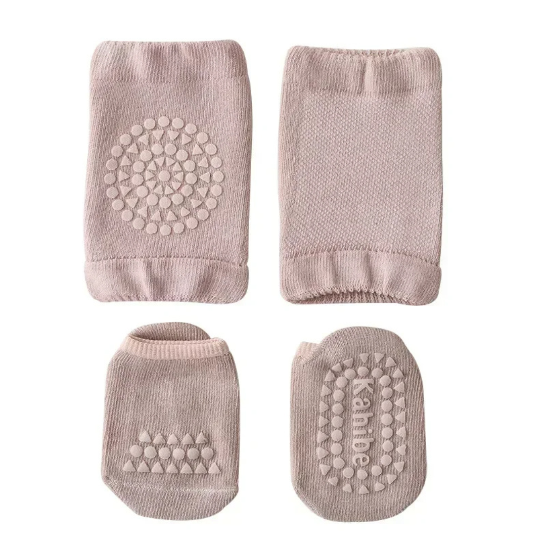 Set of four baby booties with textured sole patterns on a white background