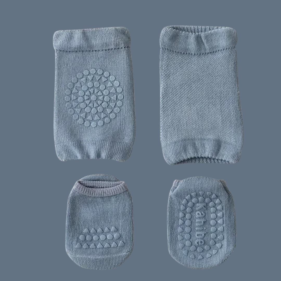 Set of blue baby knee pads and socks on a gray background