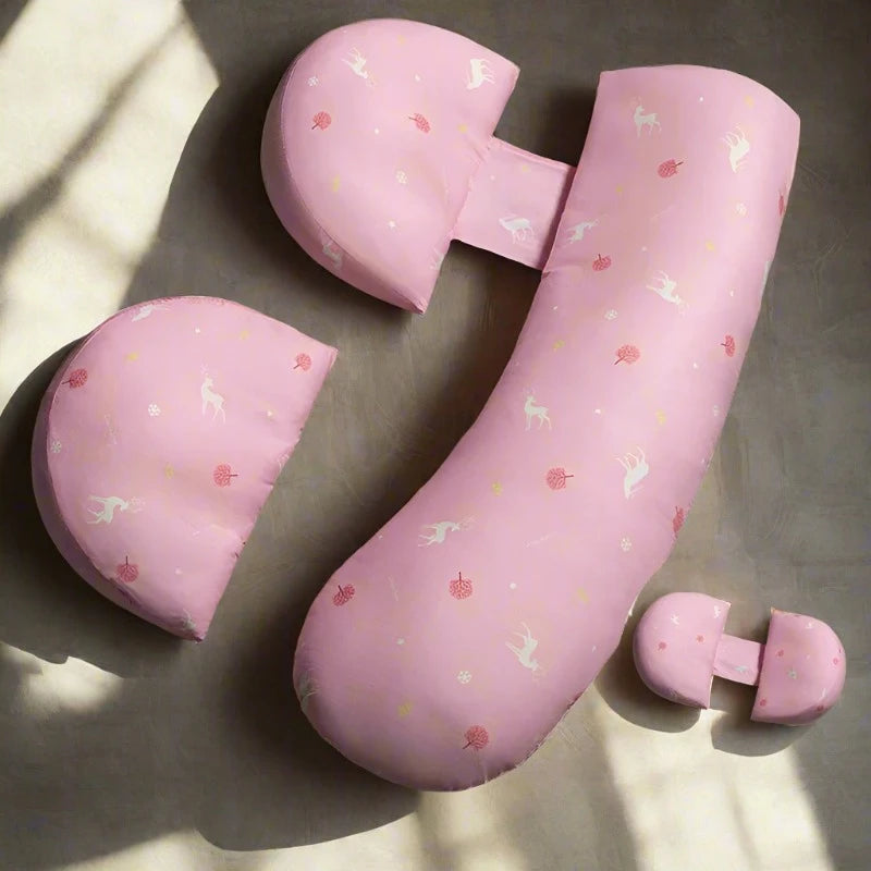 Pink and white j-shaped maternity pillow