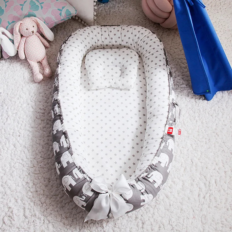 Portable Baby Nest – Soft Sleep Pod for Newborns & Travel – Mama’s Bump™ -  Grey print with Elepant patterns