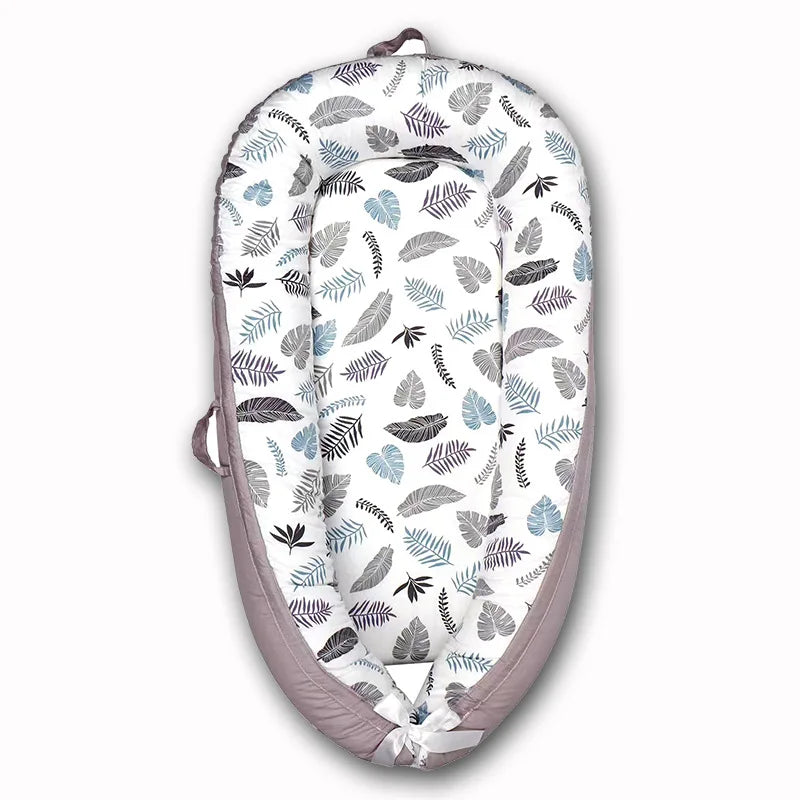 Portable Baby Nest – Soft Sleep Pod for Newborns & Travel – Mama’s Bump™ -  Leave patterns