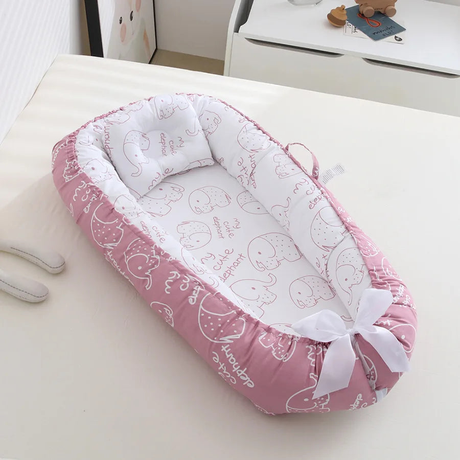 Portable Baby Nest – Soft Sleep Pod for Newborns & Travel – Mama’s Bump™ -  Pink, Elephant patterns