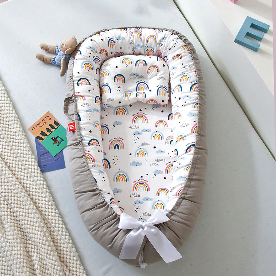Portable Baby Nest – Soft Sleep Pod for Newborns & Travel – Mama’s Bump™ -  Rainbow patterns