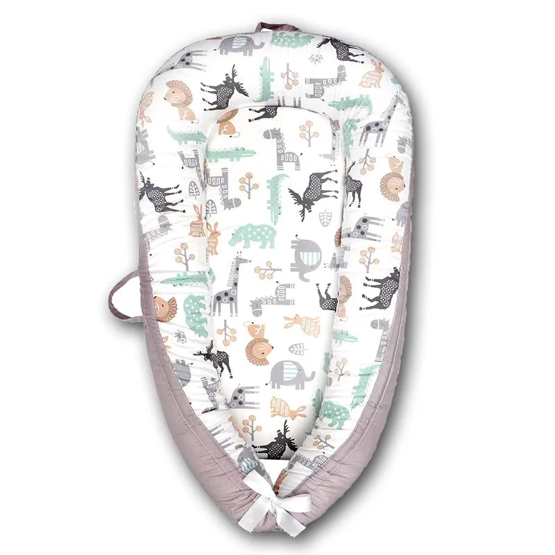 Portable Baby Nest – Soft Sleep Pod for Newborns & Travel – Mama’s Bump™ -  Wildlife patterns