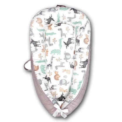 Portable Baby Nest – Soft Sleep Pod for Newborns & Travel – Mama’s Bump™ -  Wildlife patterns