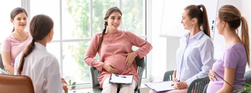 Pregnant couple attending a prenatal class