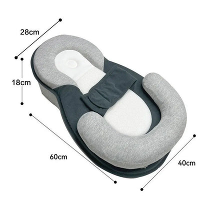 Gray and white neck pillow with measurements on a white background