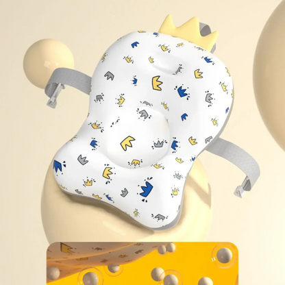 Baby head support pillow with cartoon patterns on a neutral background