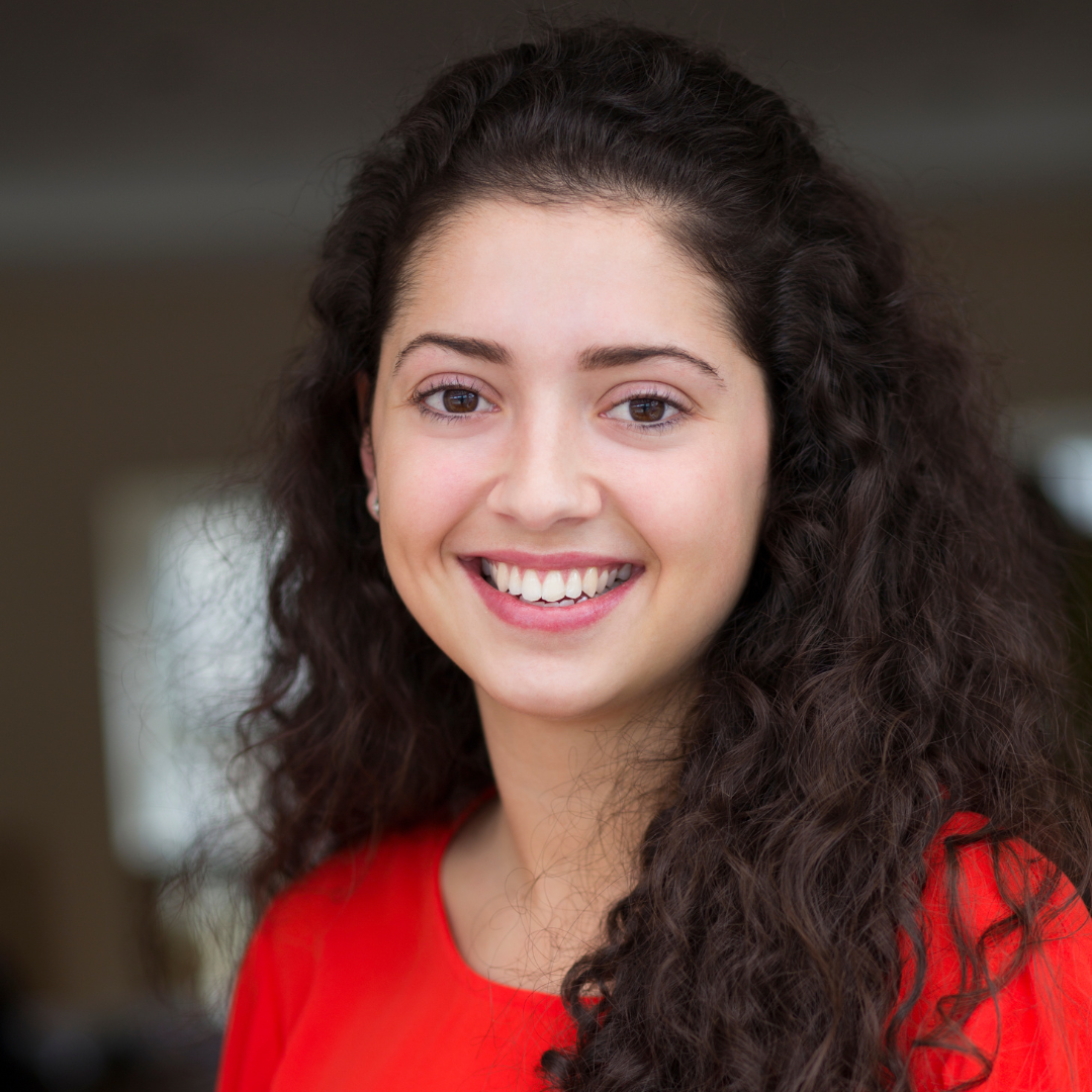 Woman headshot with brown hair