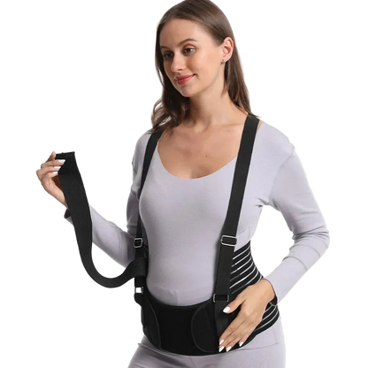 Woman wearing a black posture corrector on a white background