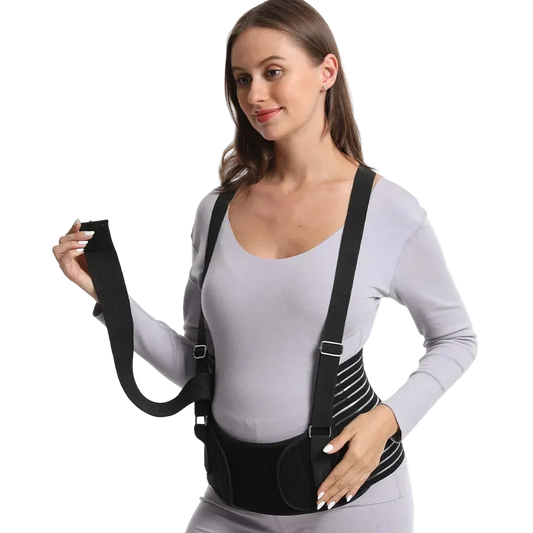 Woman wearing a black posture corrector on a white background